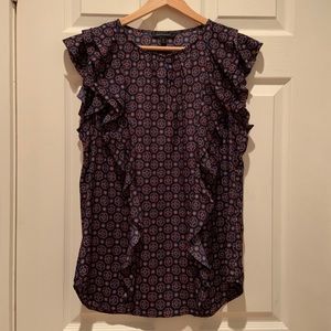 Navy blue patterned sleeveless blouse
